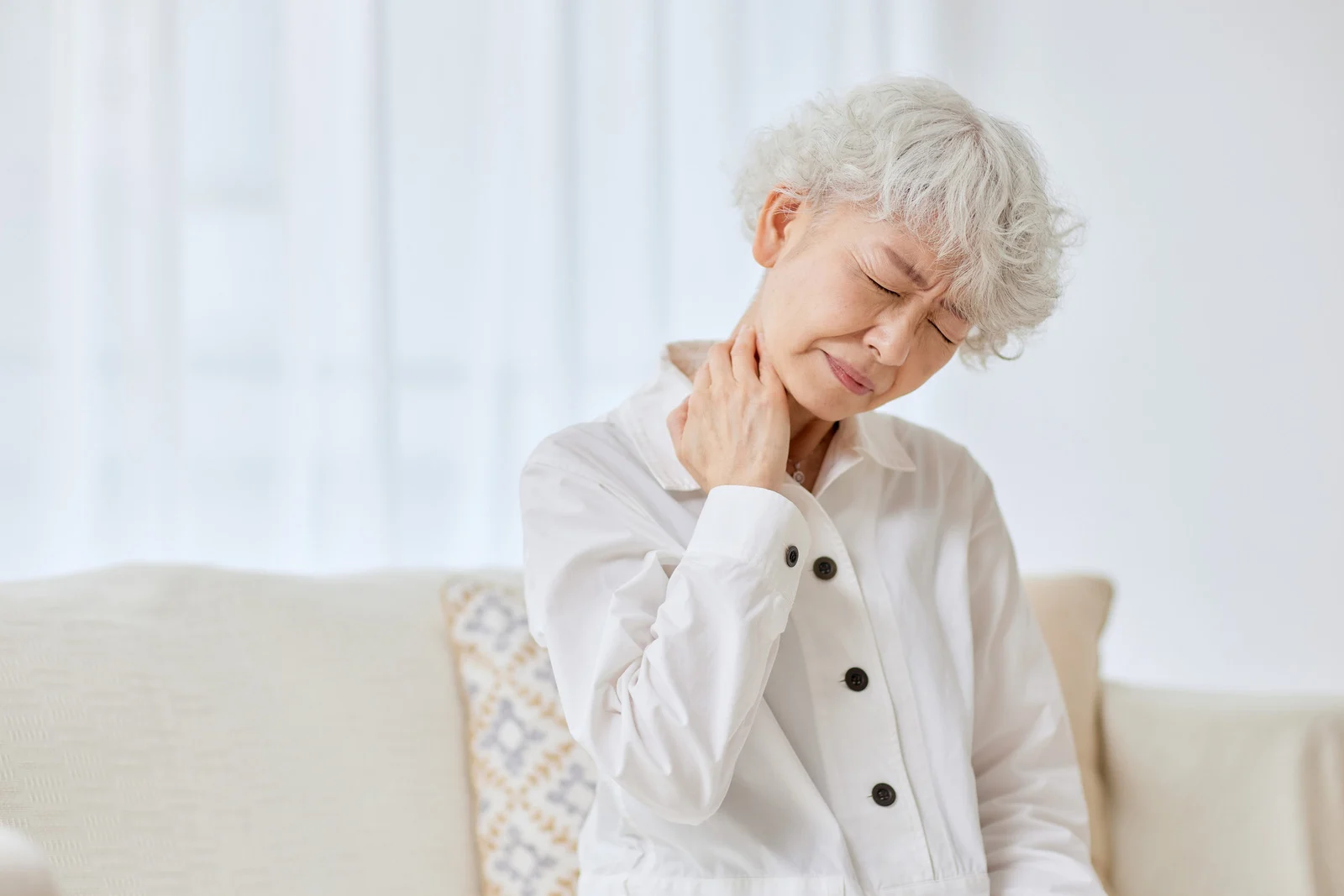 Active adult experiencing neck discomfort