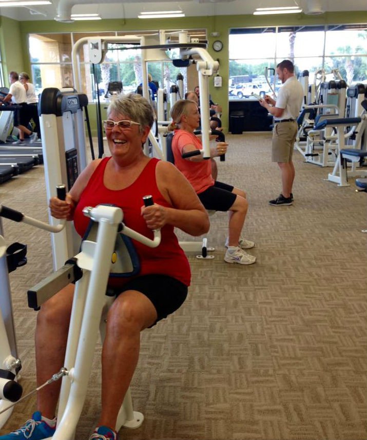 Woman using workout equipment 